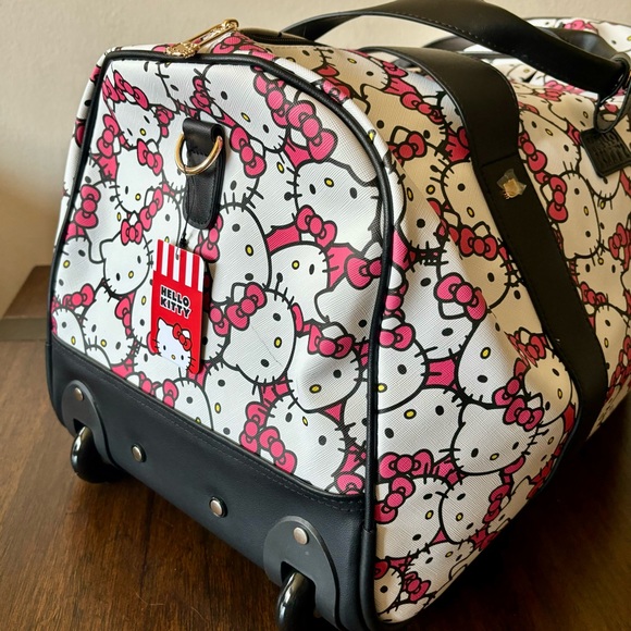 Hello Kitty | Bags | Hello Kitty Rolling Duffle Bag Luggage With Black ...